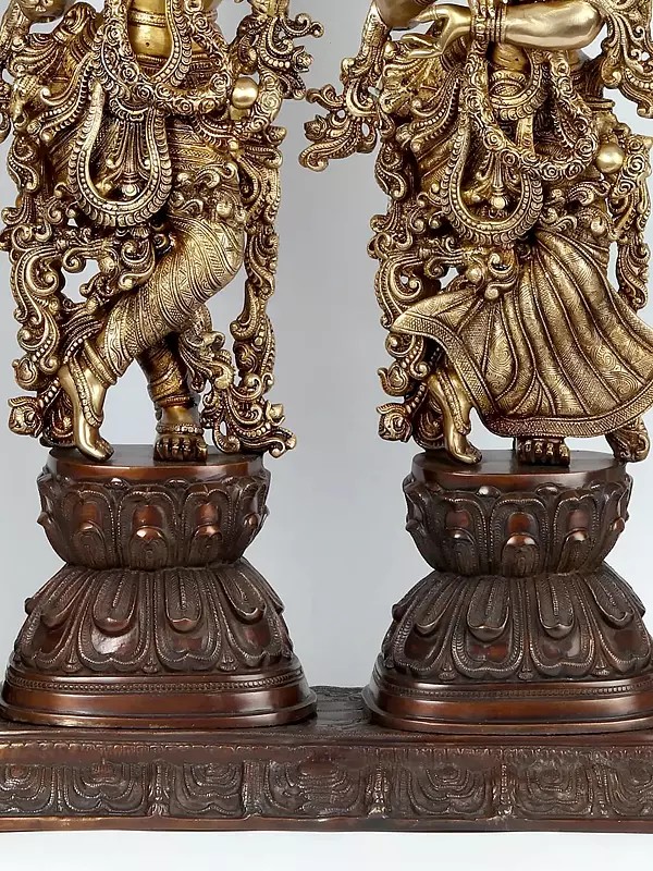 Identical Radha Krishna Statues Within An Aureole Engraved With