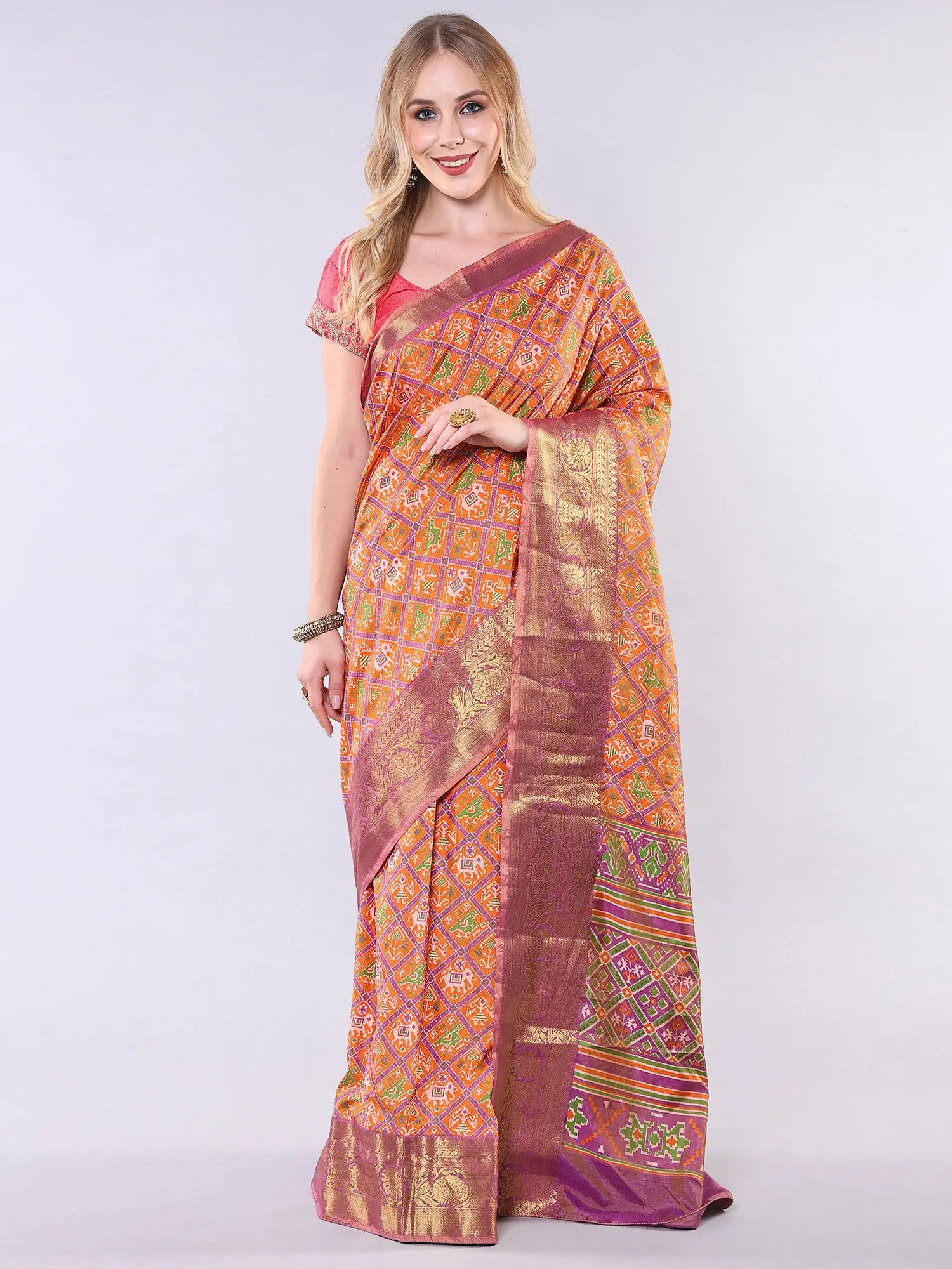 Sun-Orange Patola Saree with Woven Auspicious Motifs and Golden Thread Floral Border