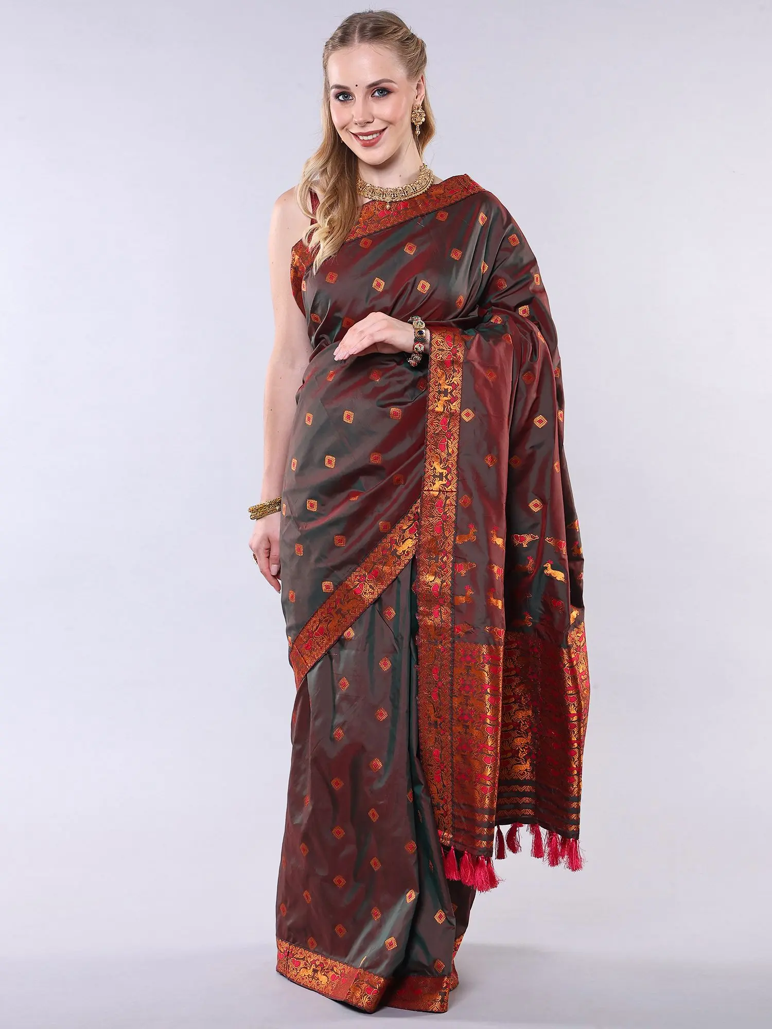 Ivy-Green Iridescent Dhoop Chaanv Muga Saree from Assam with Copper Colored Thread woven Animals and Patch Border