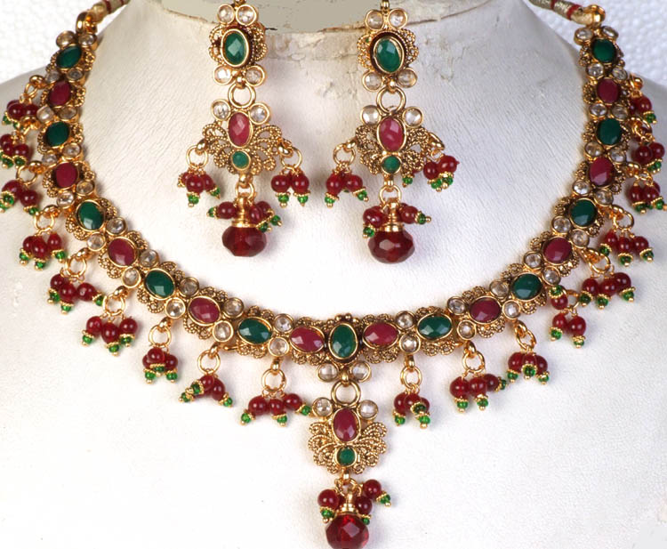 Polki Necklace and Earrings Set with Faux Ruby and Emerald | Exotic ...