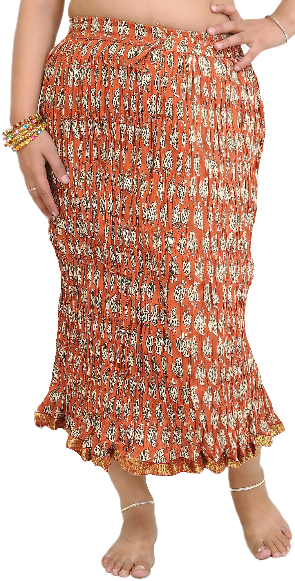 Exotic India Burnt-Brick Crushed Midi Skirt with Printed Leaves and Gota Brown 