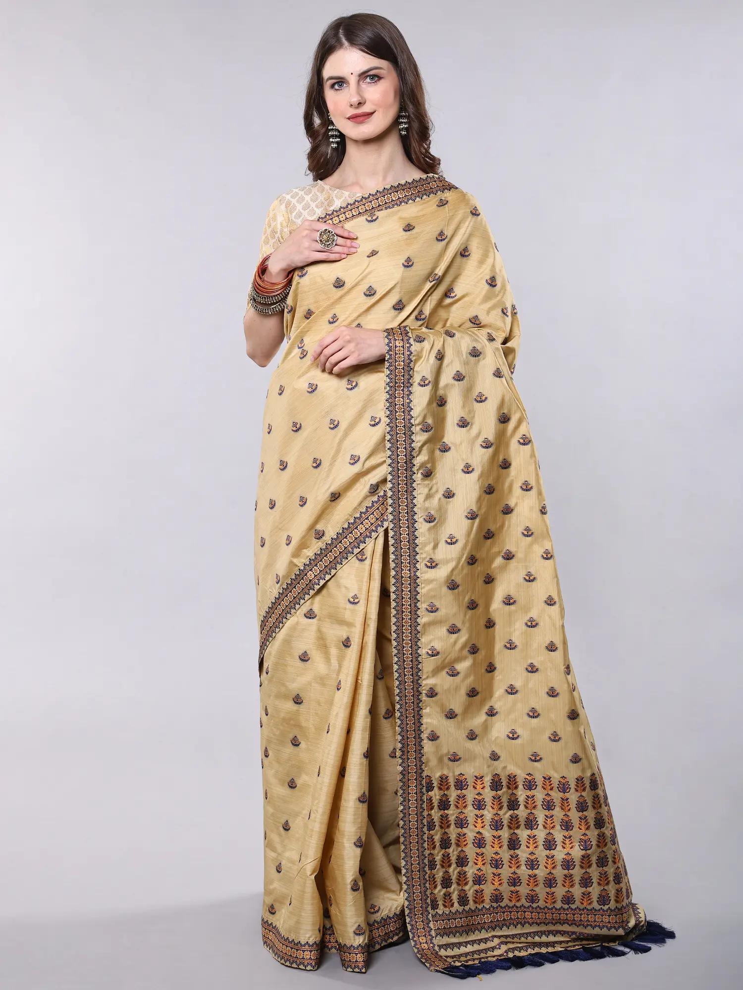 Beige Traditional Muga Saree with Thread Weave Bootis and Patchwork Border from Assam