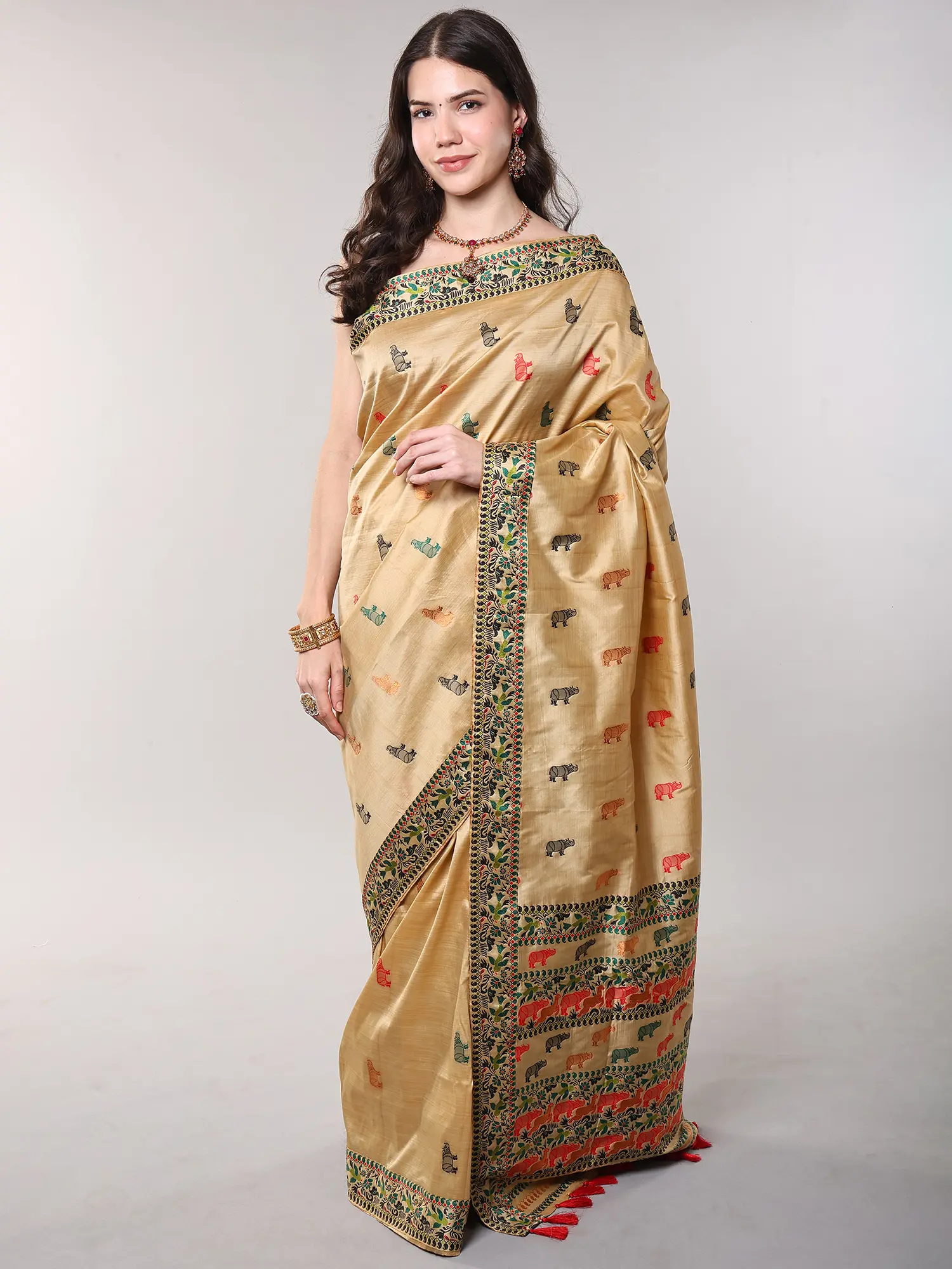 Beige Tussar Silk Saree with Woven Rhinos All-Over and Parrots Border from Assam