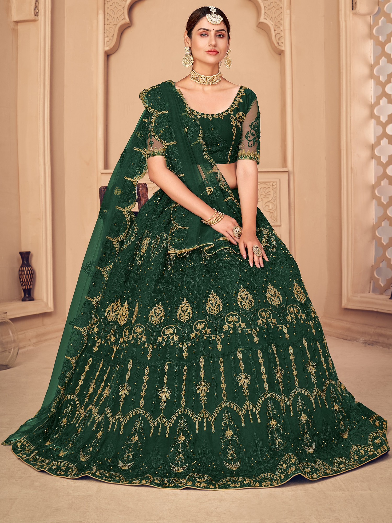 Dark-Green Net Lehenga Choli with Laddi-Mughal Motif Embellished Thread ...