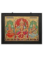 Goddess Rajarajeshwari, Lakshmi, and Saraswati Adorned in Their Majestic Finery | Tanjore Painting with Teakwood Frame | Traditional Colors with 24K Gold