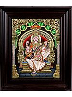Goddess Saraswati Seated in Lalitasana Wearing Sari | Framed Tanjore Painting