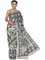 Almond-Cream Kalamkari Sari from Telangana with Printed Folk Motifs and Peacocks