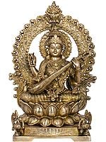 16" Goddess Saraswati Seated On Lotus Seat With Kirtimukha Aureole in Brass | Handmade | Made In India