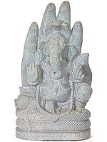 Lord Ganesha Seated on Sheshnaga in the Backdrop of a Hand