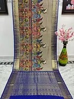 Trench-Coat Kalmakari Kanjivaram Silk Saree with Depiction of Victory in War and Celebration Painted on Body and Zari Repeating Pattern Pallu