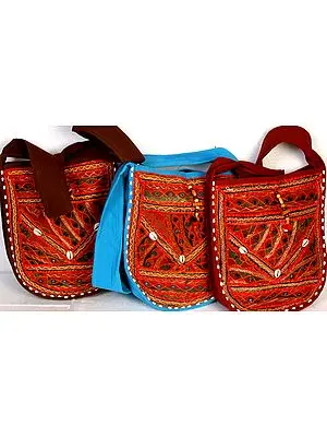 Lot of Three Densely-Embroidered Handbags with Cowries and Mirrors