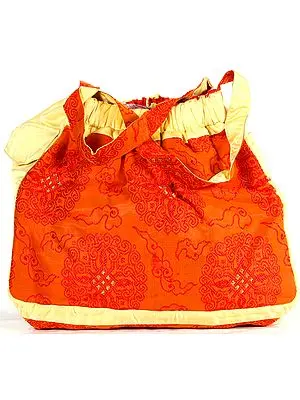 Amber and Crean Tibetan Endless Knot Banarasi Brocaded Handbag with Side Pockets