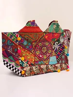Shoulder Bag from Kutch with Floral Embroidery and Pom Poms