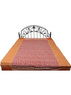 Coral and Red Single Bed Bedspread with Ikat Weave Hand-Woven in Pochampally
