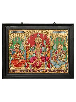Goddess Rajarajeshwari, Lakshmi, and Saraswati Adorned in Their Majestic Finery | Tanjore Painting with Teakwood Frame | Traditional Colors with 24K Gold