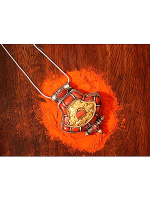 Tibetan Sterling Silver Pendant with Coral Gemstone