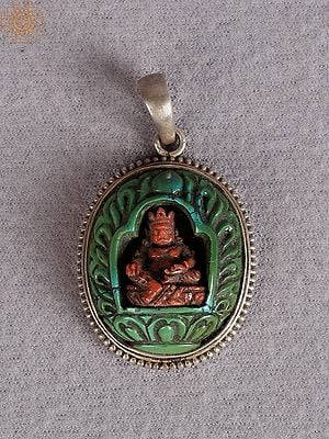 Silver Kubera Pendant with Emerald And Coral Stone