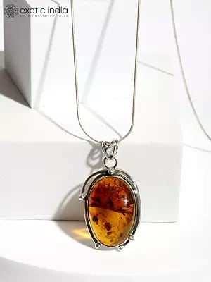 Oval Amber Cabochon Pendant in Sterling Silver
