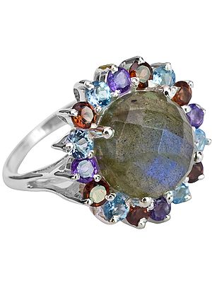 Faceted Labradorite Ring with Blue Topaz, Amethyst and Garnet