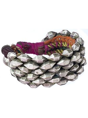 Wristlet with Knitted Silver Thread Base