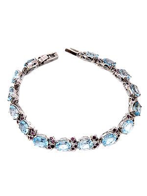 Faceted Blue Topaz Bracelet with Ruby