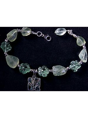 Faceted Aquamarine Beaded Bracelet with Carved Flowers and Abalone Charm
