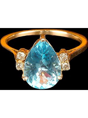 Faceted Tear Drop Blue Topaz Ring with Diamonds