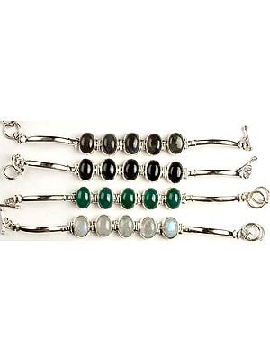 Lot of Four Gemstone Cabochon Bracelets (Labradorite, Black Onyx, Green Onyx and Rainbow Moonstone)