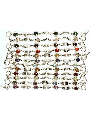 Lot of Twelve Gemstone Bracelets<br>(Malachite, Rose Quartz, Black Onyx, Carnelian, Rutilated Quartz, Lapis Lazuli, Rainbow Moonstone, Tiger Eye, Garnet, Prehnite, Labradorite & Amethyst)