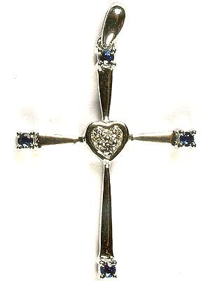White Gold Cross Valentine Pendant with Sapphire and Diamonds (Four Sapphires+ .11 Carats, Three Diamonds = .04 Carats)