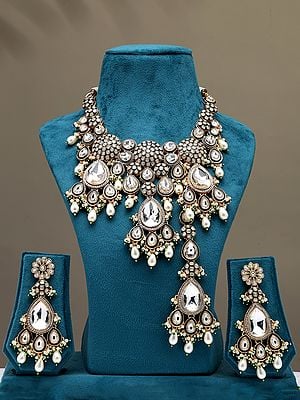 White Kundan and Cluster Beads Necklace Set with Earrings and Mangtika