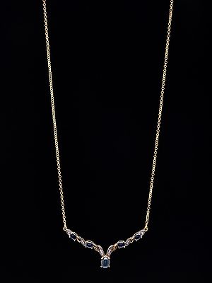 Leaf Motif Sterling Silver Necklace Featuring Blue Sapphires
