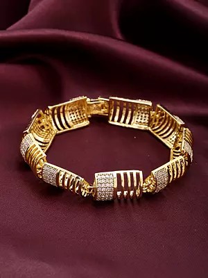 Gold Tone Bracelet with Sparkling Cubic Zirconia and Ribbed Detailing