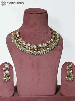 Embellished Copper And Kundan Stone Studded Beaded Necklace Set With Earrings