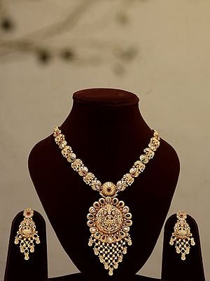 Stone Studded Goddess Lakshmi long Necklace Set with Earrings