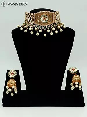 Kundan Choker Set With Hanging Pearls And Earrings In Brass