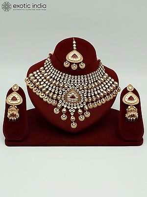Red Kundan Stone Heavy Necklace Set With Mangtika And Earrings
