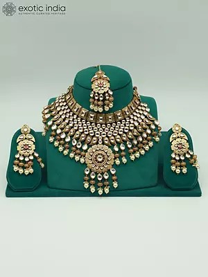 Brass Heavy Necklace Set With Kundan Mangtika And Beads Earrings