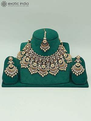 Heavy Kundan Necklace Set With Mangtika And Dangling Pearl Earring