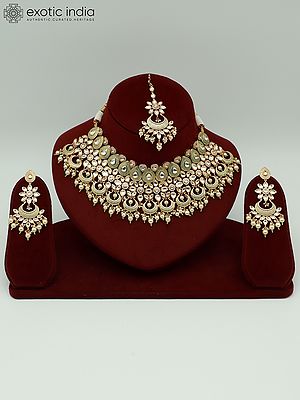 Brass Choker Necklace Set With Attractive Carving And Hanging Pearls