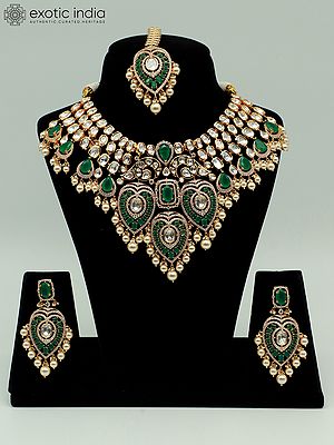 Leaves Design Brass Heavy Necklace Set With Mangtika And Earrings