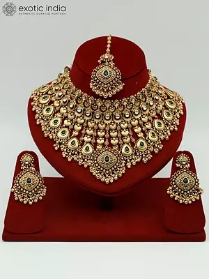 Heavy Bridal Necklace Set With Studded Kundan Mangtika And Attractive Earrings