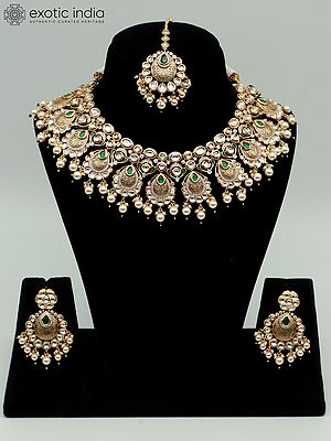 Designer Necklace Set With Hanging Beads Mangtika And Brass Carving Earrings