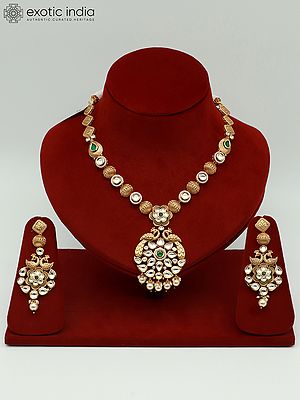 Attractive Kundan Studded Necklace Set With Peacock Pendant And Earrings