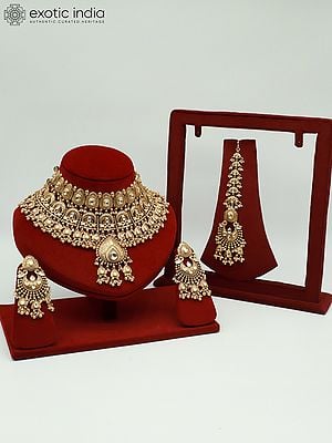 Brass Heavy Necklace Set For Bride With Attractive Carving Earrings And Elegant Mangtika