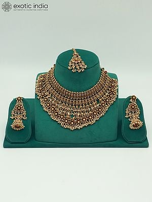 Intricate Carving Bridal Necklace Set With Beautiful Mangtika And Earrings