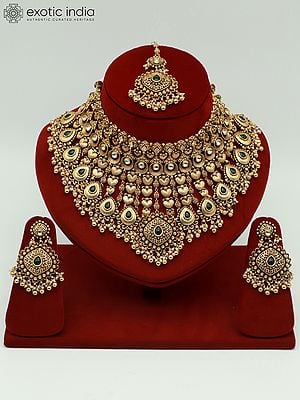 Traditional Necklace Set With Intricate Carvings And Beautiful Earrings