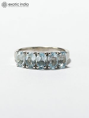 Oval Cut Faceted Blue Topaz Ring