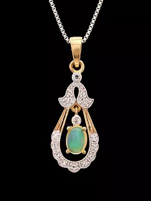 Teardrop Shape Pendant with Pave-Set Silver Frame and Oval Opal in Center