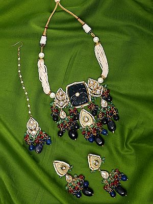 Multistand Kundan Choker Set with Maang Tikka Earrings and Bead Drops
